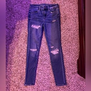 Ripped blue American Eagle jeggings